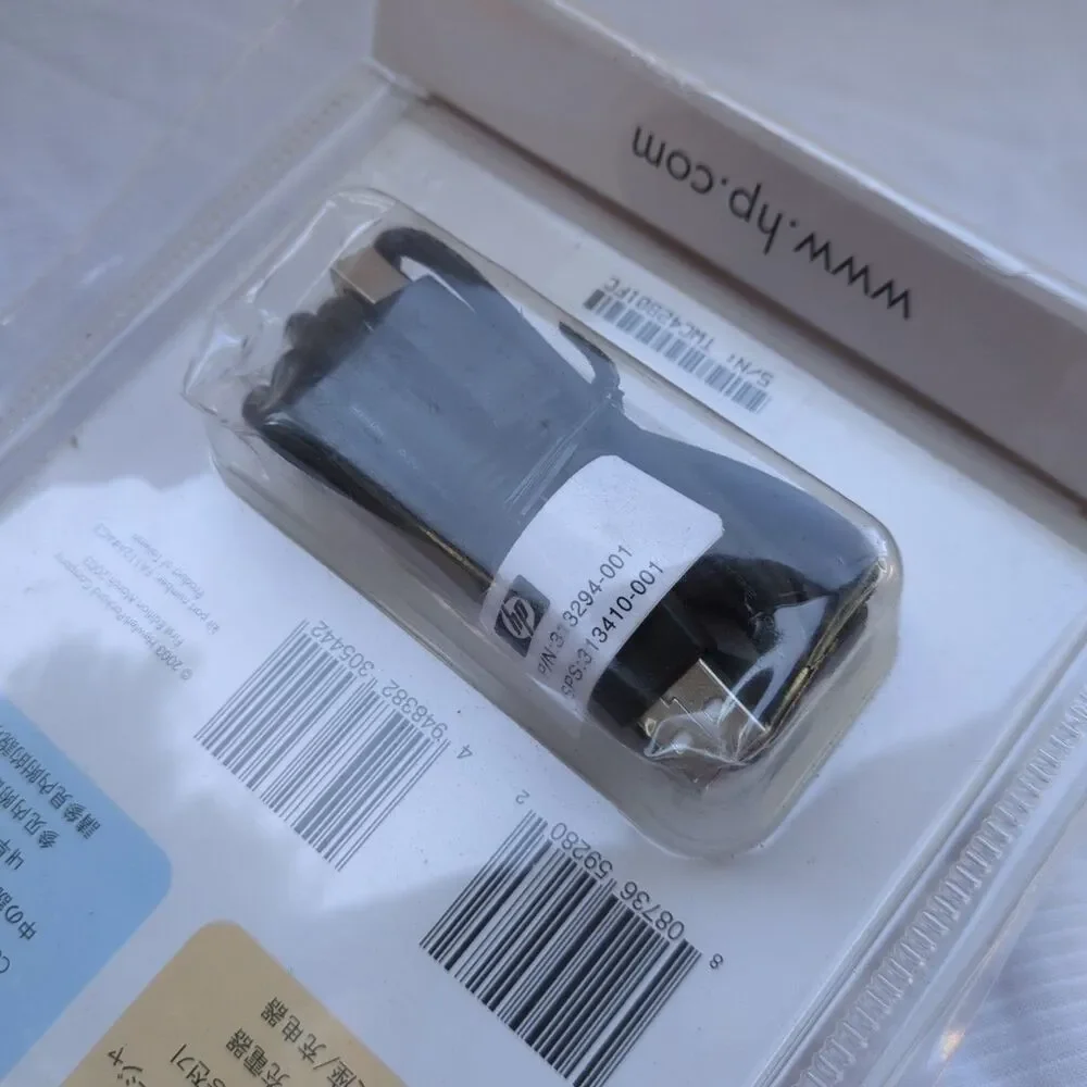 HP iPAQ Pocket PC h1900 series USB dock/charger.